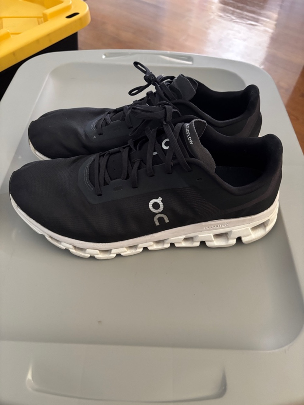 ON Cloudflow Black Running Shoes with White Sole